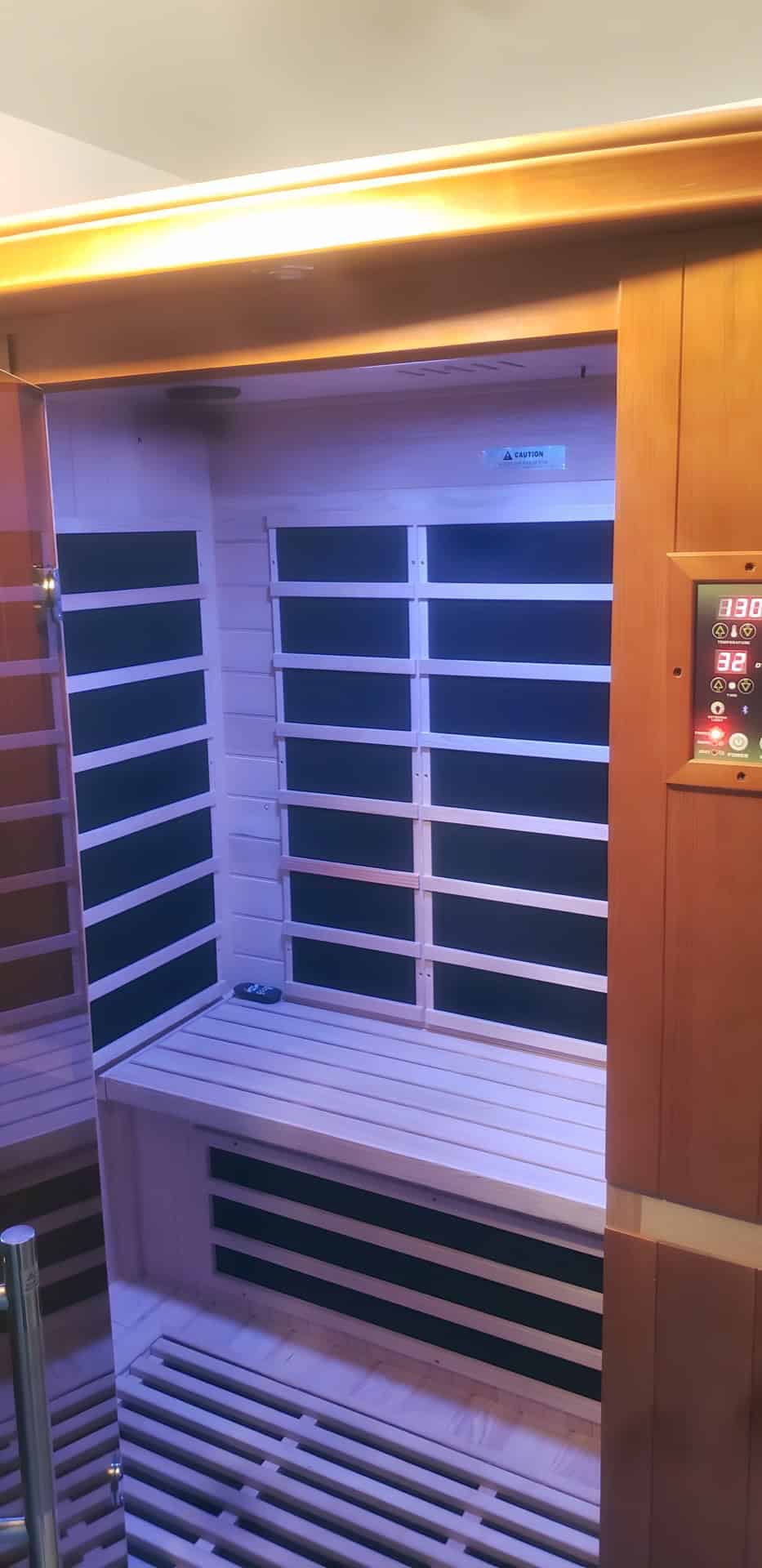 Cedar infrared sauna with chromotherapy LED lighting and digital control panel — basement finishing