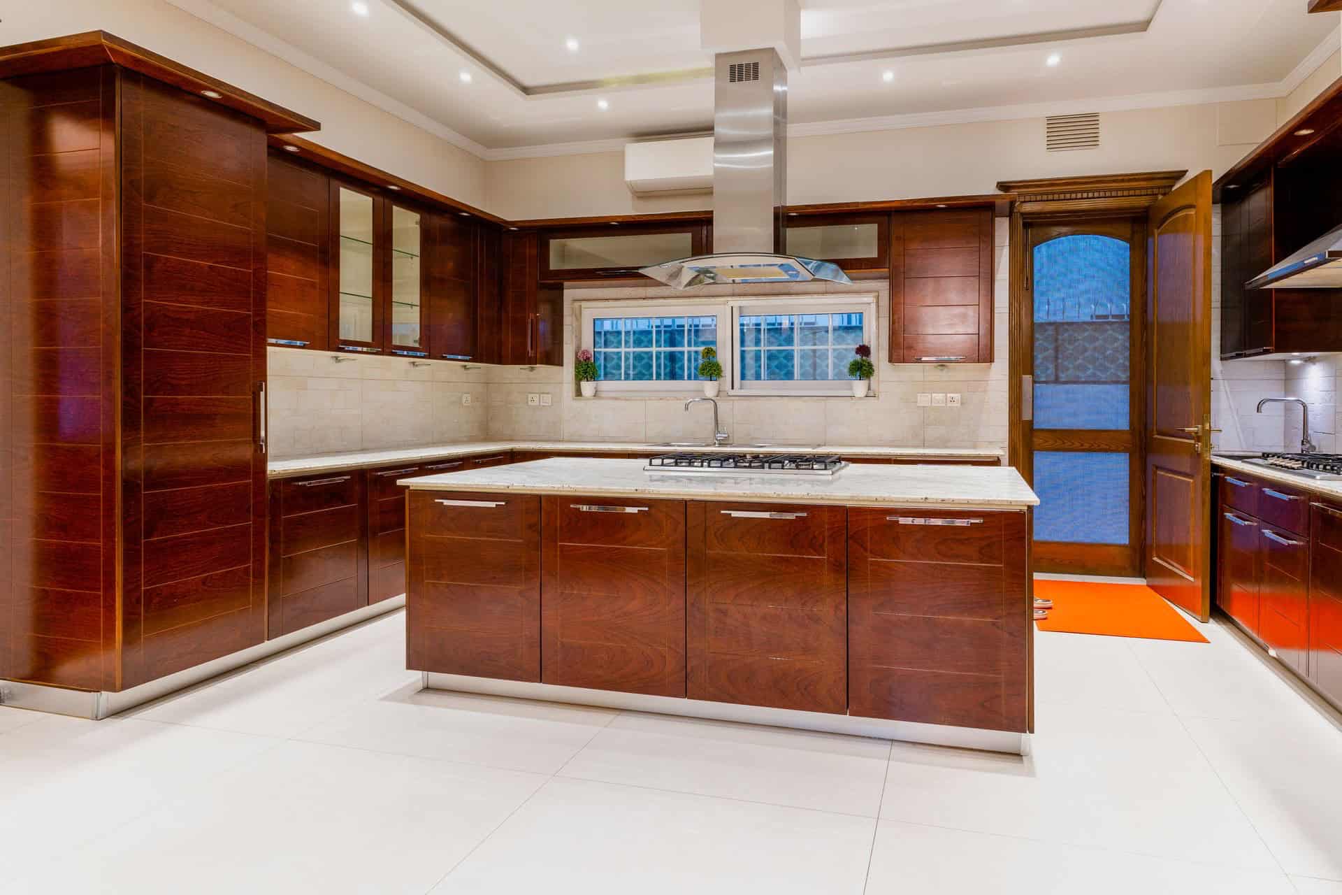 Modern luxury kitchen with dark cabinetry and premium finishes